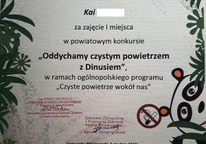 Dyplom za zajęcie I miejsca w powiatowym konkursie "Oddychamy czystym powietrzem z Dinusiem" w ramach ogólnopolskiego programu "Czyste powietrze wokół nas".